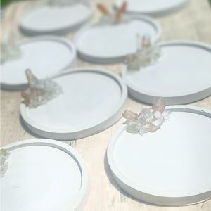 Circle trinket trays with neutral color crystals